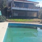 REF 067 CASA Y DEPARTAMENTO EN COLECTORA DE RUTA 38, CON VISTA AL LAGO, VILLA PARQUE SÍQUIMAN U$S165.000
